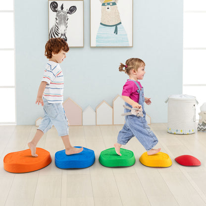 The kids stepping stones being used by two children walking across them in a bright playroom