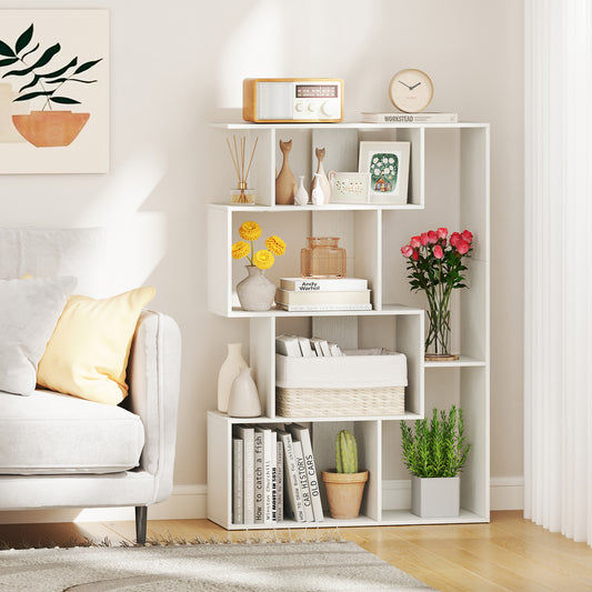 The white geometric bookcase positioned beside a sofa in a living room