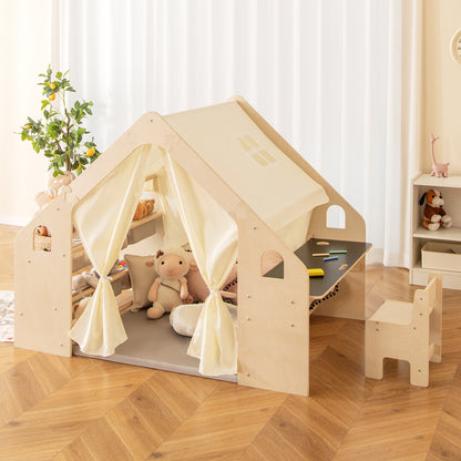 The play tent with blackboard and storage bins, set up in a room with toys and a plant