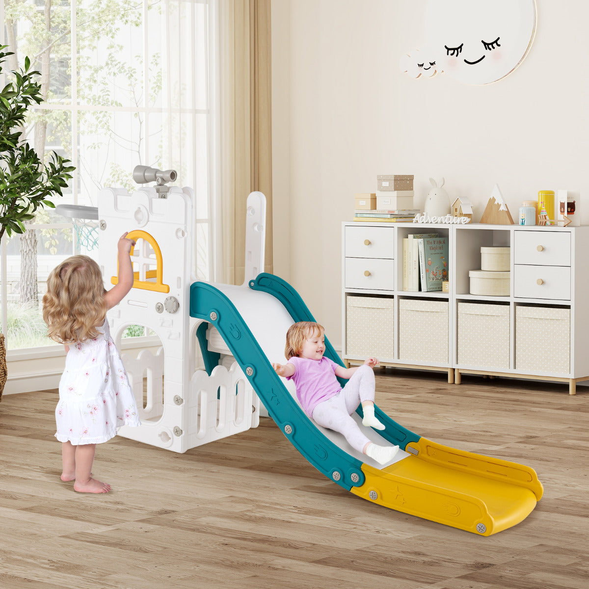 Two toddlers enjoying the L-shaped slide and climbing steps
