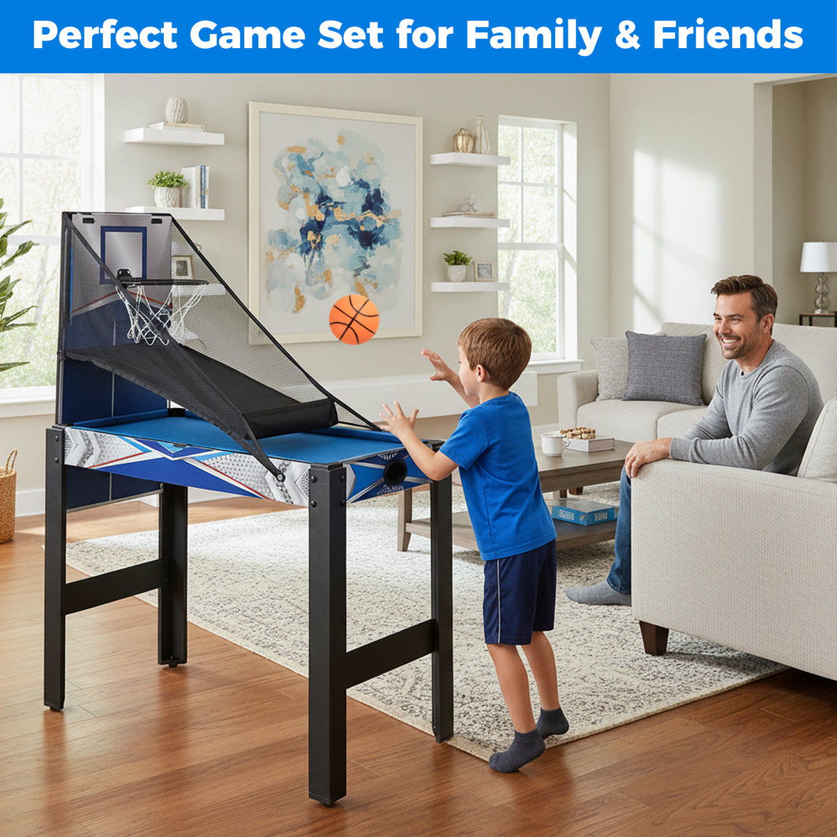 A young boy playing basketball on the game table in a comfortable home environment