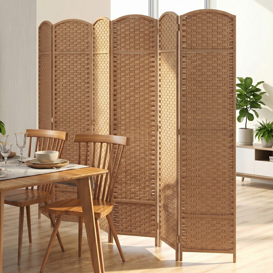 The room divider placed in a bright dining room next to a wooden table and chairs