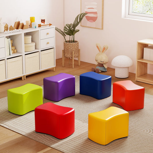 6-Piece Butterfly Stools Modular Soft Foam Seating Set in rainbow colours arranged on a rug