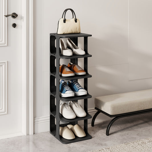 The shoe rack standing in a hallway with a handbag placed on the top shelf