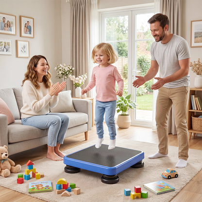 Kids Rebounder Bouncing Board, a happy toddler bounces on the mini trampoline while her parents watch in a living room