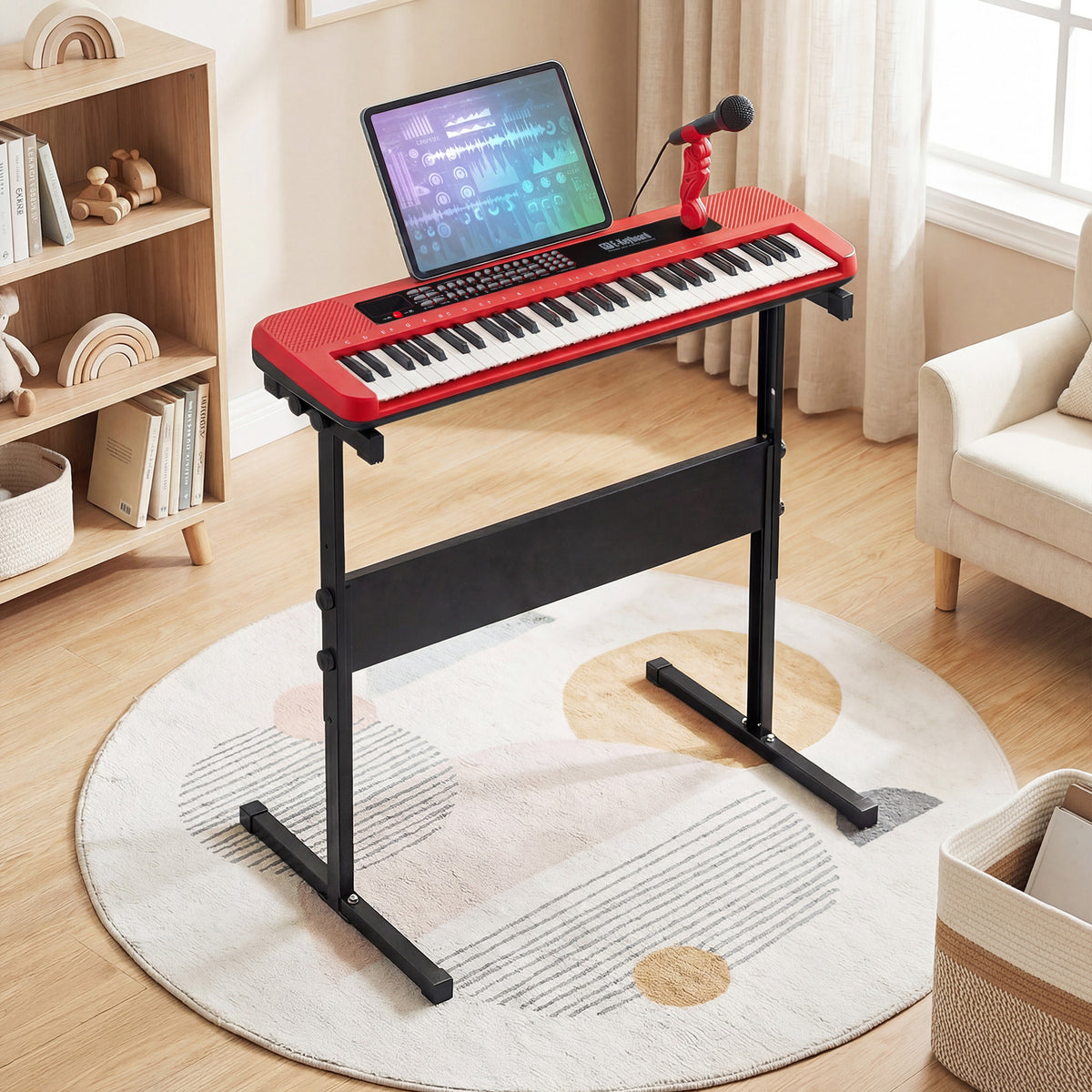 The red kids electric piano keyboard on its stand in a bright room with a rug and shelves