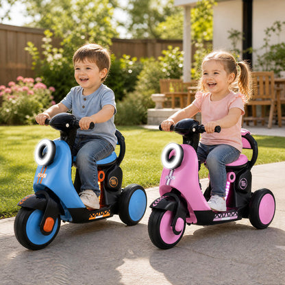 Two smiling children, a boy and a girl, ride blue and pink kids electric motorbikes in a garden setting