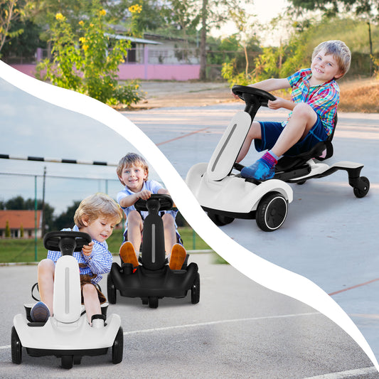 Two happy children playing with the kids electric drift car outdoors