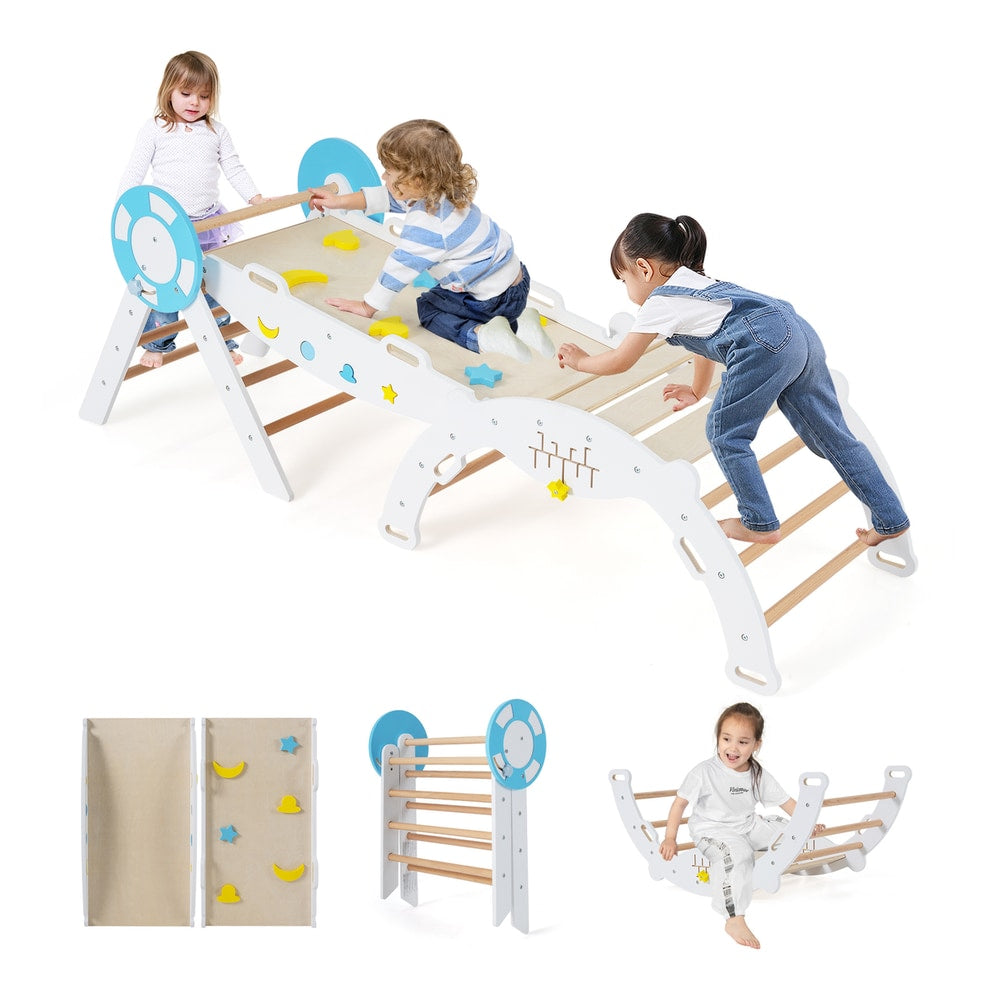 Three children interacting with the white climbing frame set in a room