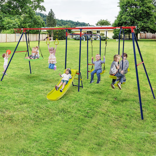 The swing set in a garden with multiple children playing on the different attachments