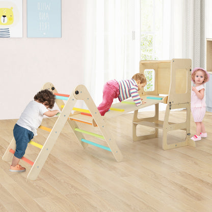 Children playing on the colourful wooden climbing frame with a slide and a step stool