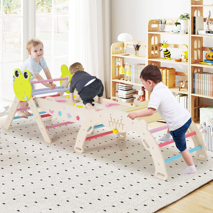 Three children playing on the wooden climbing frames in a bright nursery room with bookshelves