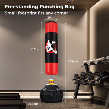 The freestanding punching bag with dimensions shown in a room with weights