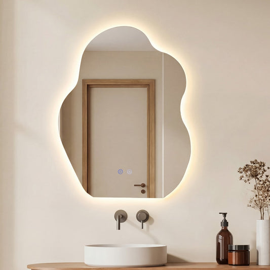 Irregular LED Bathroom Mirror with 3 Light Colors mounted on a wall above a bathroom sink