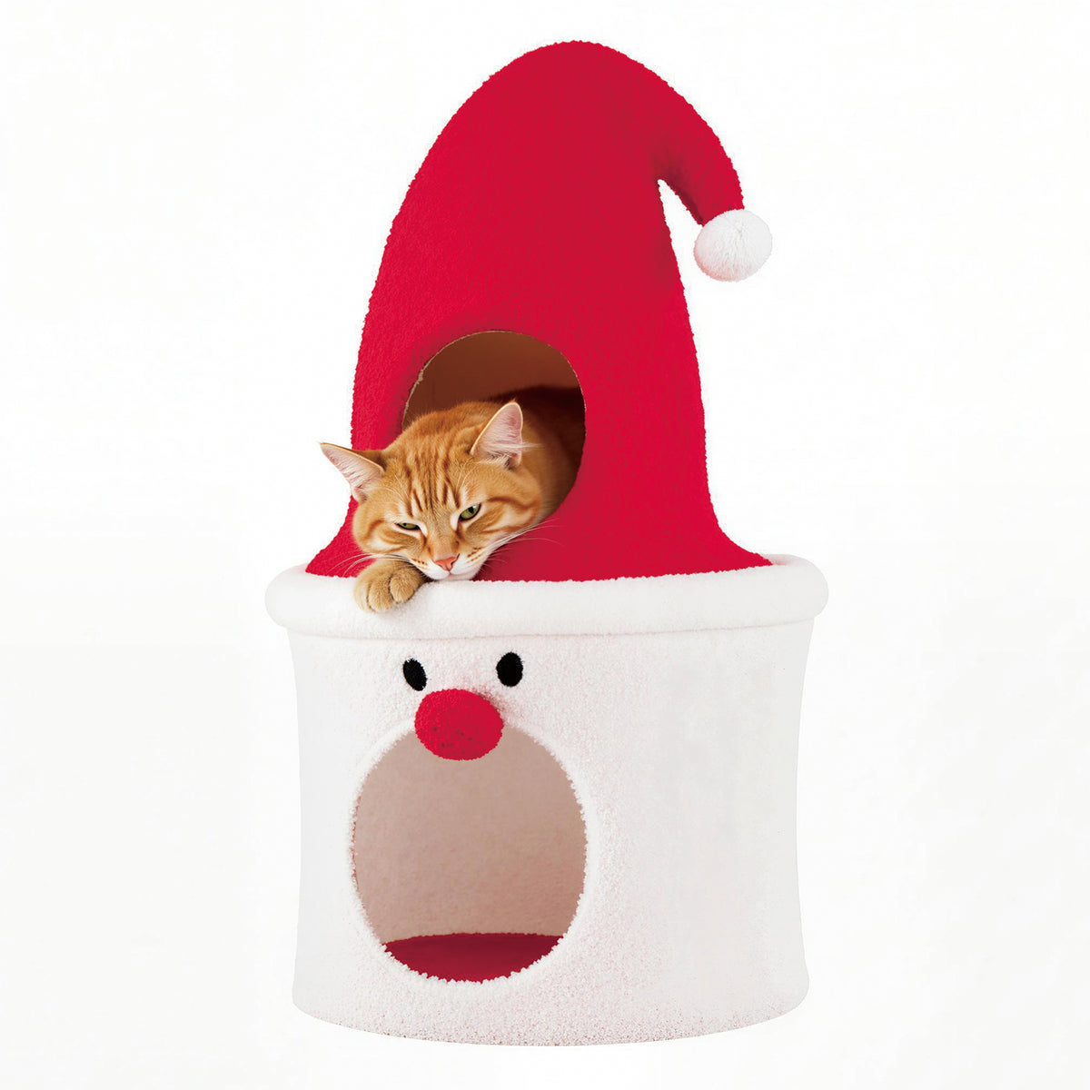 A ginger cat rests its head on the edge of the top opening of the cat condo