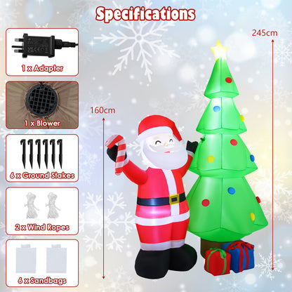 This Christmas inflatable decoration with Santa and tree is shown with its included accessories and dimensions