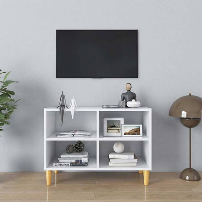 TV Cabinet with Solid Wood Legs White in a room with a TV above and decorative items