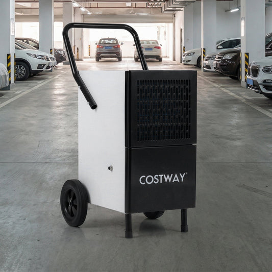 The commercial dehumidifier with built-in water pump shown in a car park setting