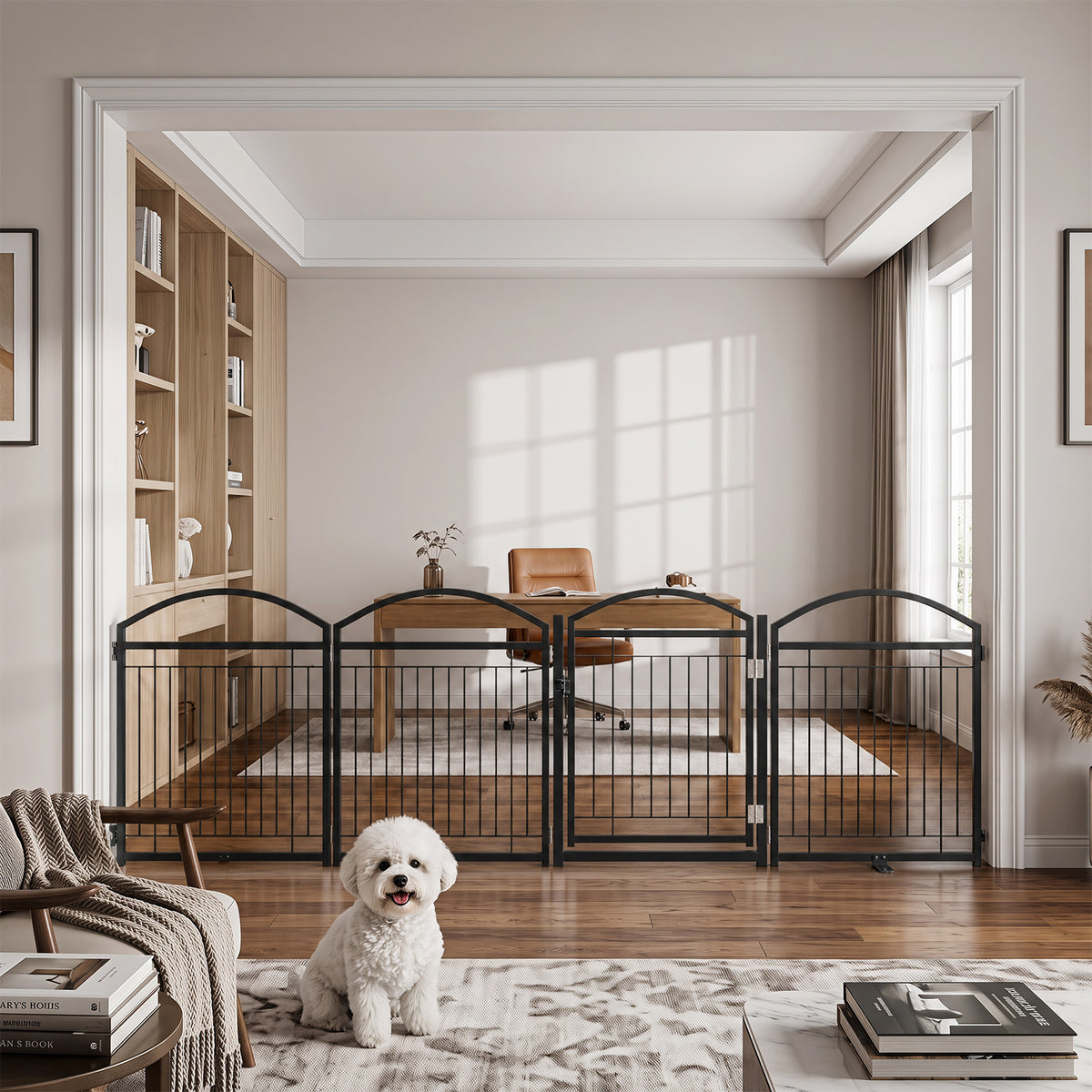 The pet gate set up in a home office doorway with a small white dog sitting on the wooden floor