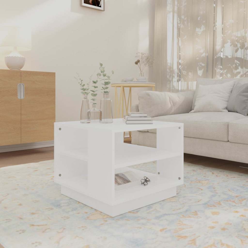 White coffee table in a bright room with a sofa and rug