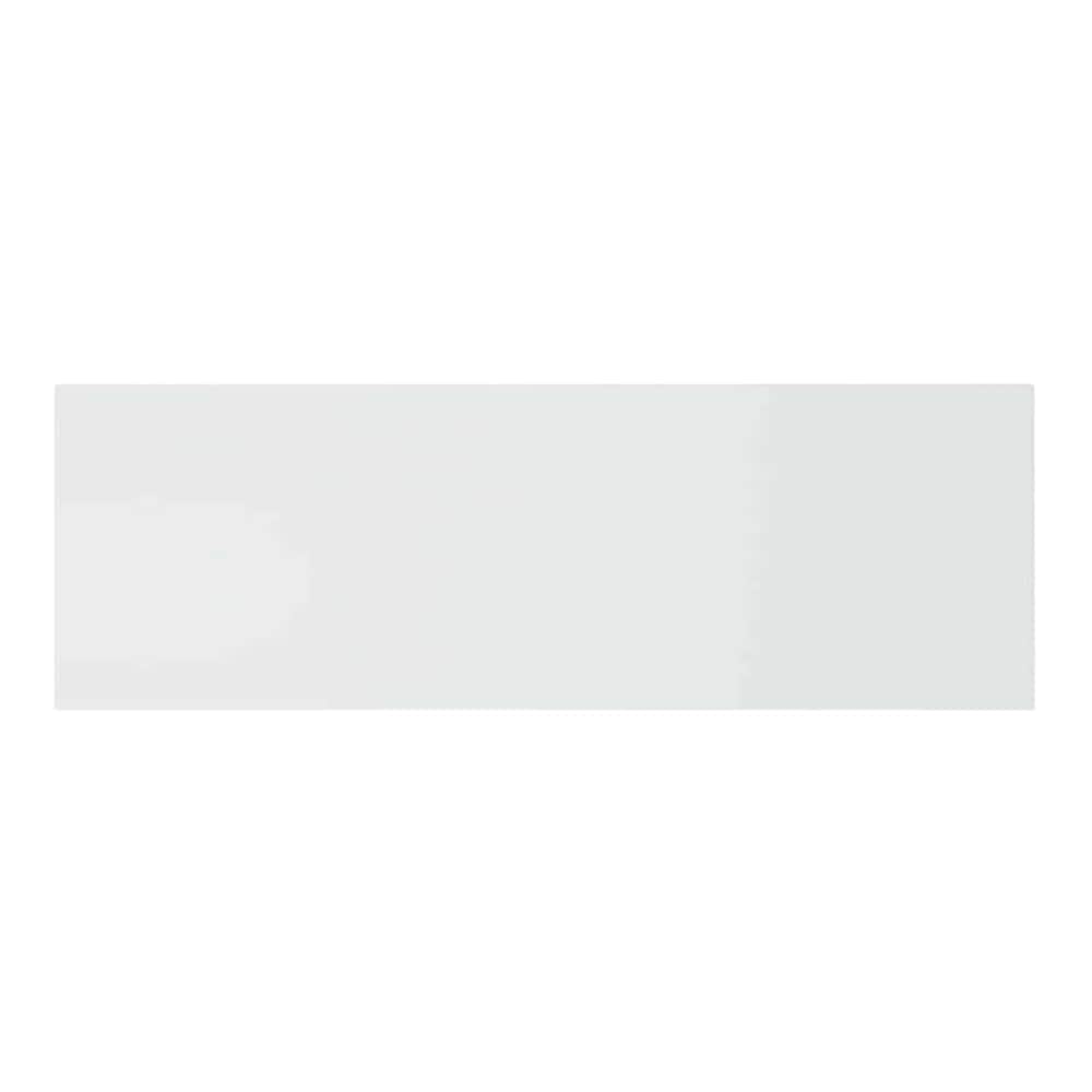 A close up of the white engineered wood wall headboard