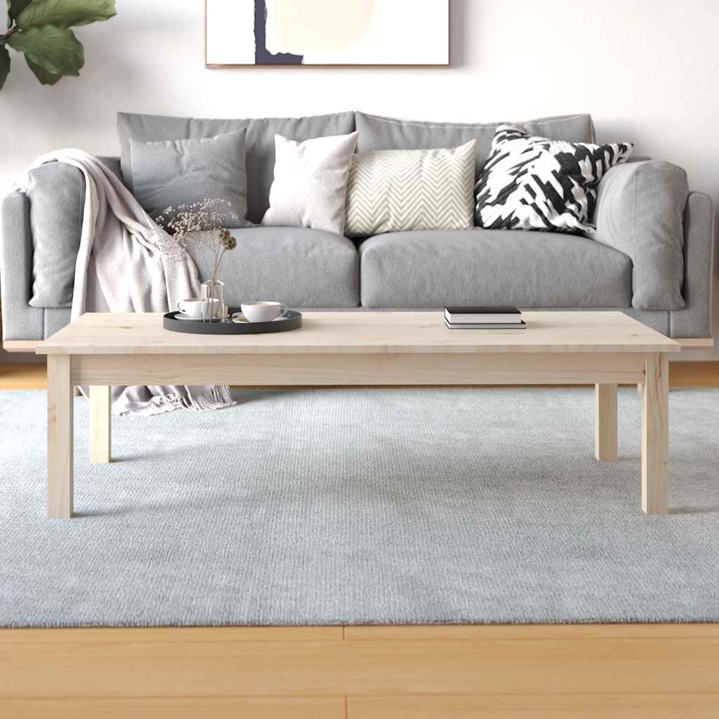 The solid wood pine coffee table in a lounge with a sofa and decorative items