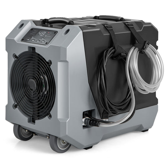 85 L/Day Commercial Dehumidifier with Auto Defrost in black and grey with a coiled hose on the side