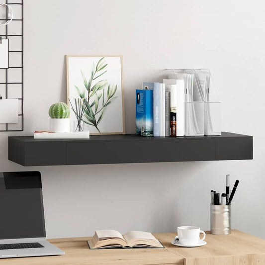 Floating Wall Shelf with Drawer Black mounted on a wall above a desk with books and decor