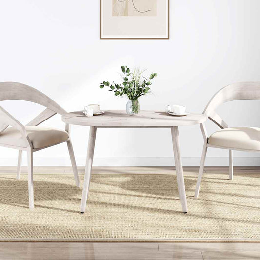 The table top is set up as a dining table with two chairs and a vase of flowers in a bright room