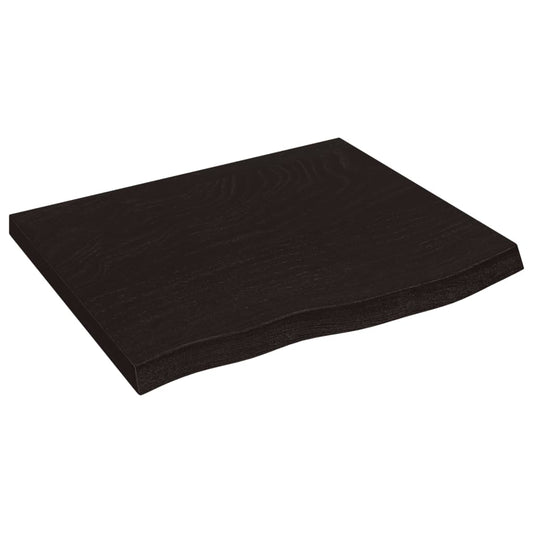A close-up of the dark brown solid wood oak shelf with a wavy edge