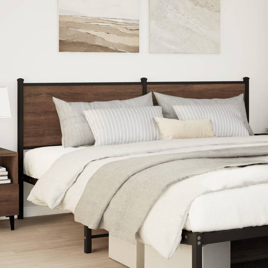 The brown oak headboard is shown fitted to a bed with pillows and bedding