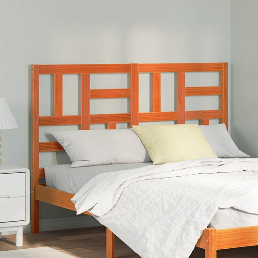 vidaXL Bed Headboard Wax Brown Solid Pine Wood attached to a bed frame with white bedding
