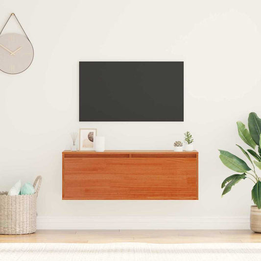 vidaXL Wall Cabinet Wax Brown Solid Pine Wood mounted on a wall below a television in a living room
