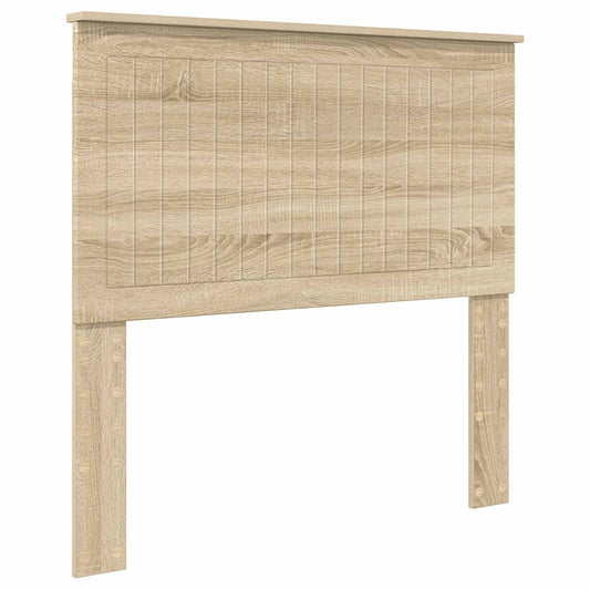 The wooden headboard viewed from an angled perspective showing the panelled surface