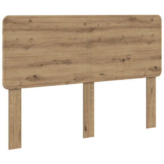 The oak effect headboard is shown freestanding with two support legs