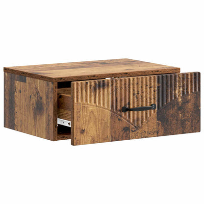 The bedside cabinet with its drawer pulled open