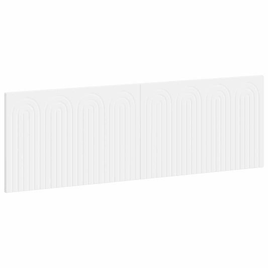 The white engineered wood headboard with a decorative arched pattern