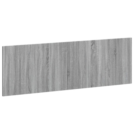 The grey Sonoma engineered wood headboard with vertical ribbed texture