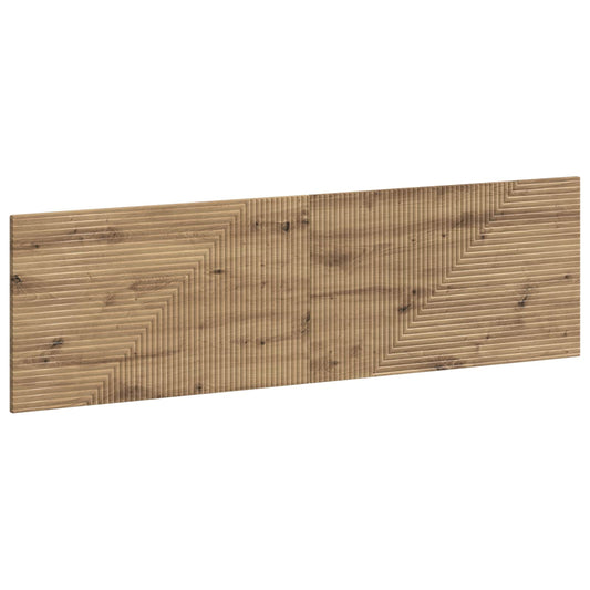 The wall-mounted headboard has a ribbed wood effect pattern in artisan oak