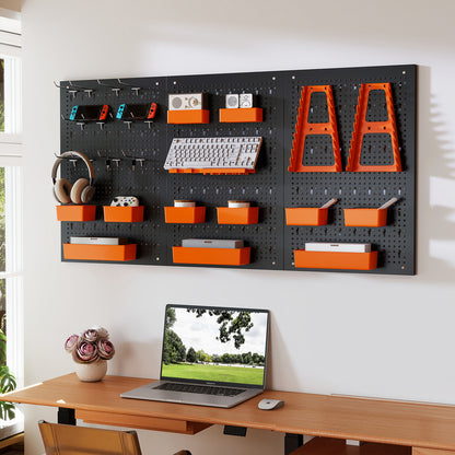 The parts organizer mounted on a wall above a desk with a laptop, headphones, and keyboard