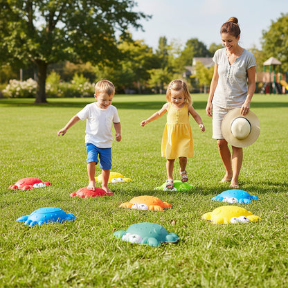 A mother and children playing on the crab stepping stones in a sunny park