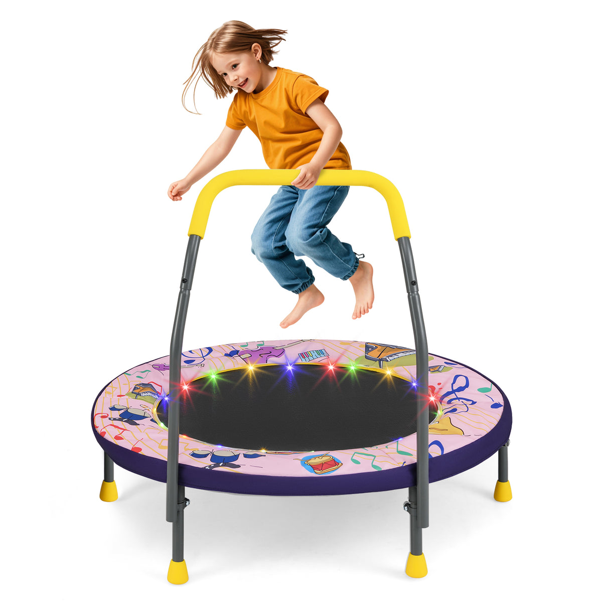 A young girl jumps on the pink folding mini trampoline with musical notes and LED lights, with a yellow safety bar
