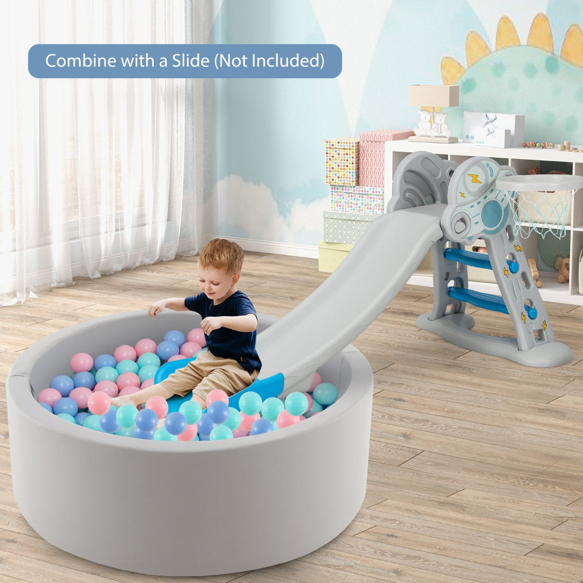 The soft play set positioned next to a slide in a child's playroom