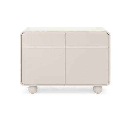 White sideboard with four doors on a white background