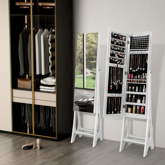 The white jewellery cabinet standing open, displaying necklaces and cosmetics