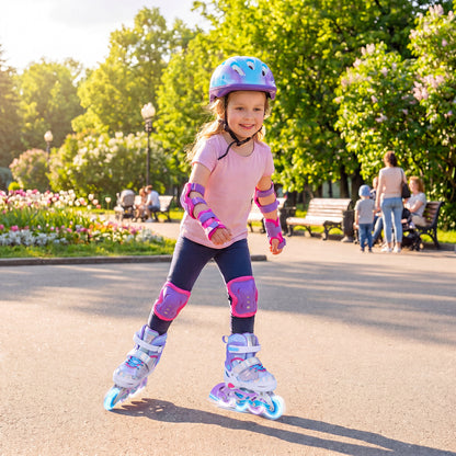 A young girl wearing protective gear and the blue adjustable inline skates, happily skating in a park