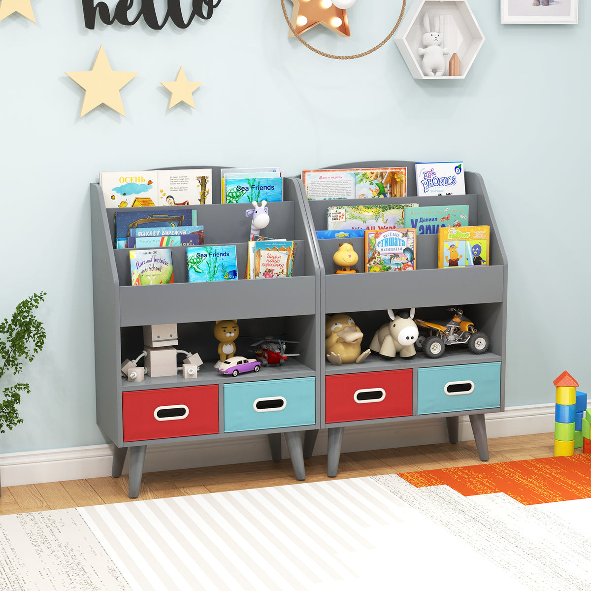 Two grey wooden bookshelves side by side in a child's bedroom