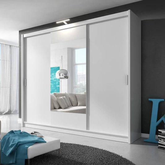 Modern living room with a white wardrobe and gray sofa