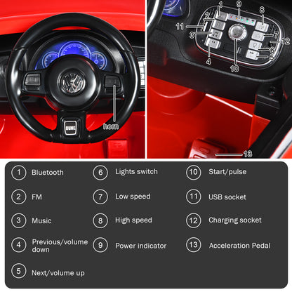 Close up of the dashboard and steering wheel of the red kids electric ride on car