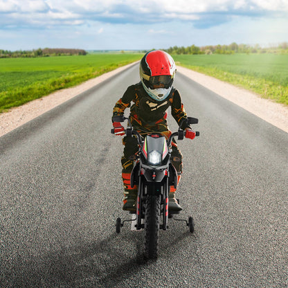 Child in red helmet riding the kids electric motorbike on a road